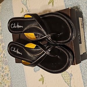 Cole Haan black sandals.